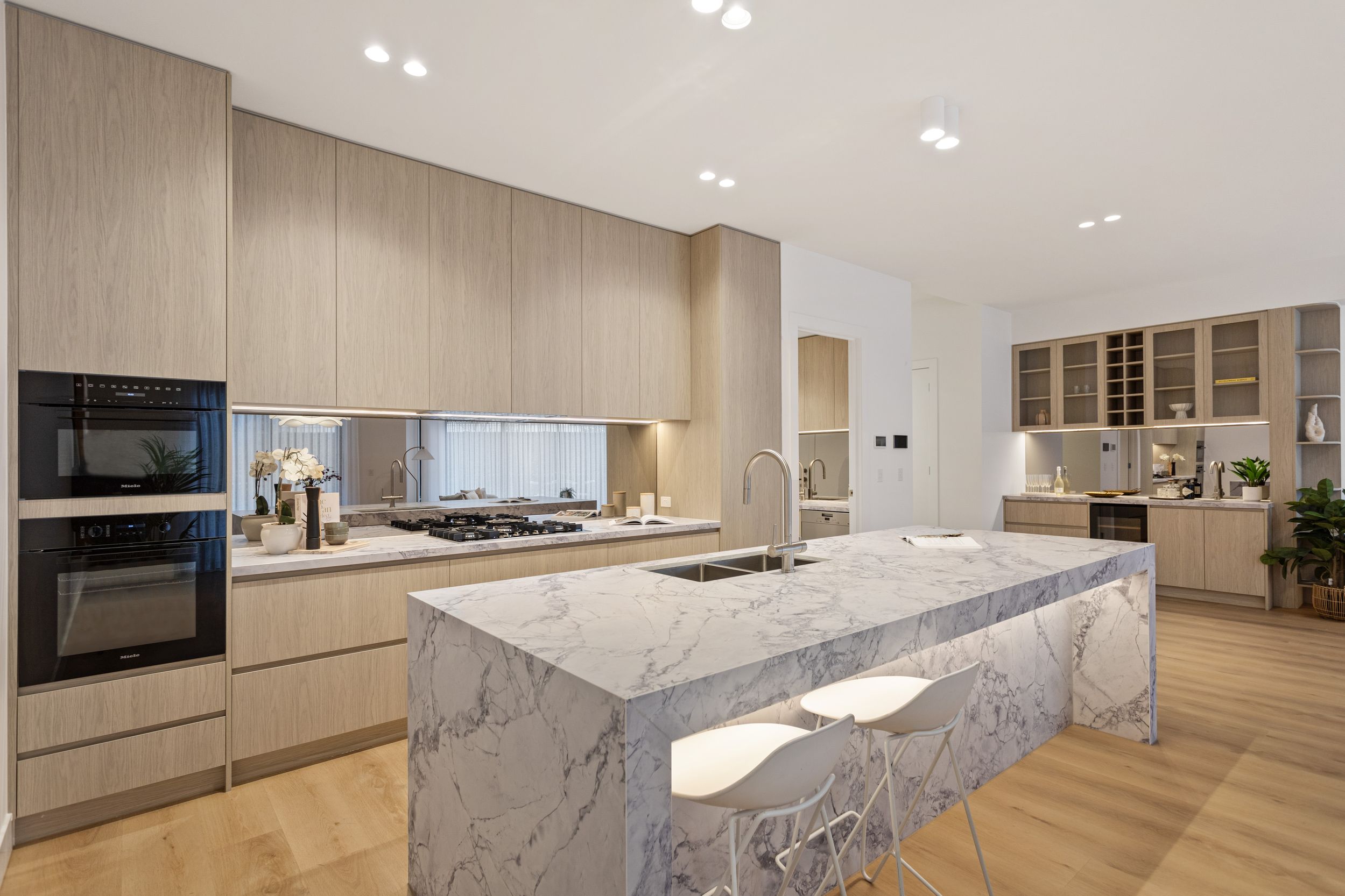 Kitchen with marble waterfall island