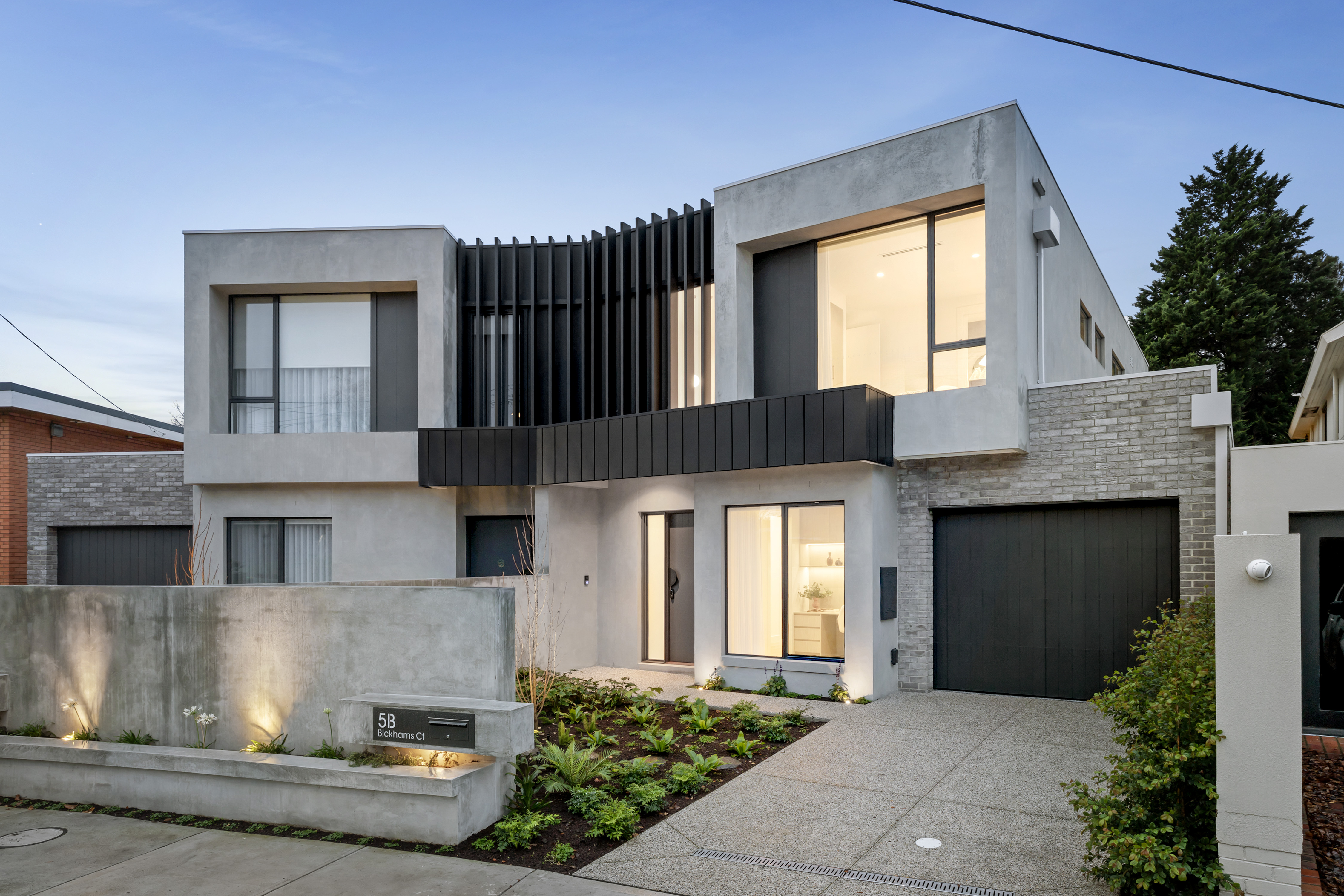 Renshaw facade at dusk, 5B Bickhams Court
